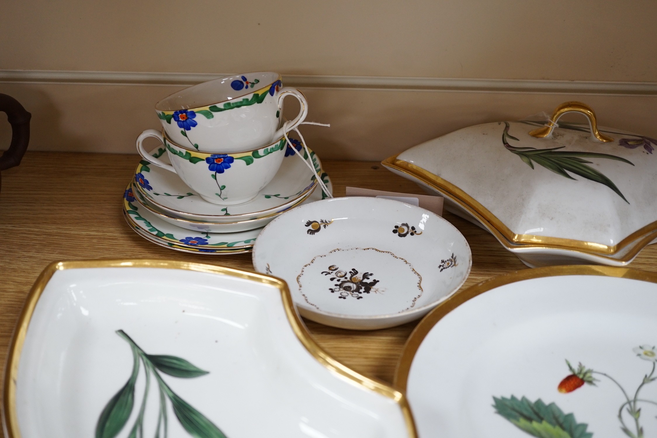 A Chamberlains Worcester botanical part supper set, c.1800-10, an English porcelain saucer and Bisto cups and saucers